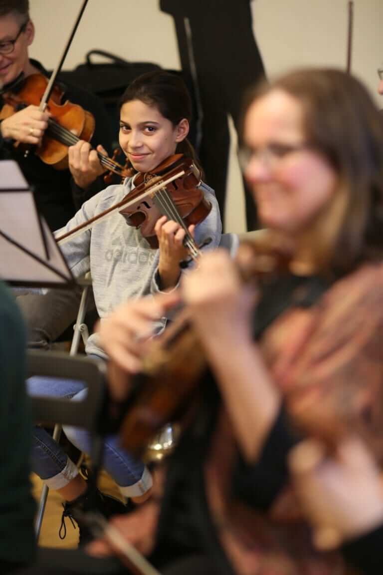 Violinists rehearsing at the Creative Strings Workshop in Lausanne